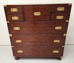 Exceptional quality walnut chest of drawers with brass mounts and handles in the campaign style {105