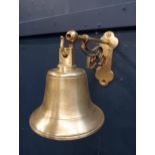 20th C. brass bell mounted on bracket {H 19cm x W 13cm x D 20cm }.