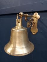 20th C. brass bell mounted on bracket {H 19cm x W 13cm x D 20cm }.