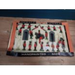Boxed set of hand painted Herald Model Soldiers. {5 cm H x 44 cm W x 28 cm D}.