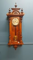 Victorian walnut Vienna wall clock with brass and enamel dial with spring driven works {130 cm H x