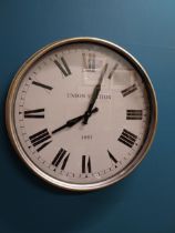Circular battery operated metal Union Station 1892 wall clock. {51 cm Dia.}