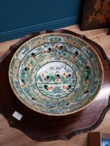 Oriental ceramic fruit bowl decorated with birds and foliage. {15 cm H x 44 cm Dia.}.