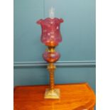 Victorian brass Corinthian column table lamp with later ruby glass bowl and shade. {71 cm H x 21