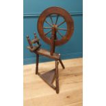 Early 20th C. oak spinning wheel raised on turned legs {109 cm H x 70 cm W x 60 cm D}.