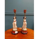 Pair of ceramic Seated Dogs in the form of candlesticks. {35 cm H x 10 cm Dia.}
