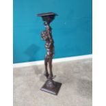 Carved stained pine jardiniere stand decorated with cherub. {101 cm H x 26 cm W x 25 cm D}.{ cm H cm