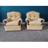 Pair of upholstered armchairs{93 cm H 94 cm W 72cm D}.