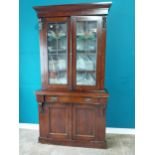 Edwardian mahogany bookcase with two stained panelled doors above two blind doors {200 cm H 104 cm W