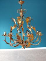 Good quality gilded metal eight branch chandelier in the Rocco style {87 cm H x 69 cm Dia.}.