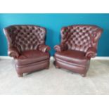 Pair of deep buttoned leather wingback armchairs{109 cm H 98 cm W 76cm D}.