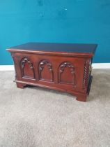 Carved mahogany blanket box with metal handles and lift up lid in the Tudor style. {50 cm H x 90