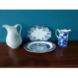 Two blue and white ceramic platters and two ceramic jugs {Jug 30 cm H x 23 cm W x 20 cm D and 20