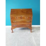 Mahogany bureau with two short drawers over two long drawers raised on cabriole legs {107 cm H 91 cm
