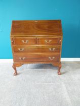 Mahogany bureau with two short drawers over two long drawers raised on cabriole legs {107 cm H 91 cm