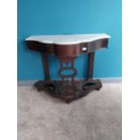 Victorian mahogany hall table with marble top raised on platform base.