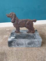 Cast iron foot scraper on carved slate base with Celtic design. {37 cm H x 34 cm W x 23 cm D{ cm H