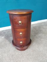 Circular mahogany beside table with three drawers. {65 cm H x 40 cm Dia.}.{ cm H cm W cm D}.