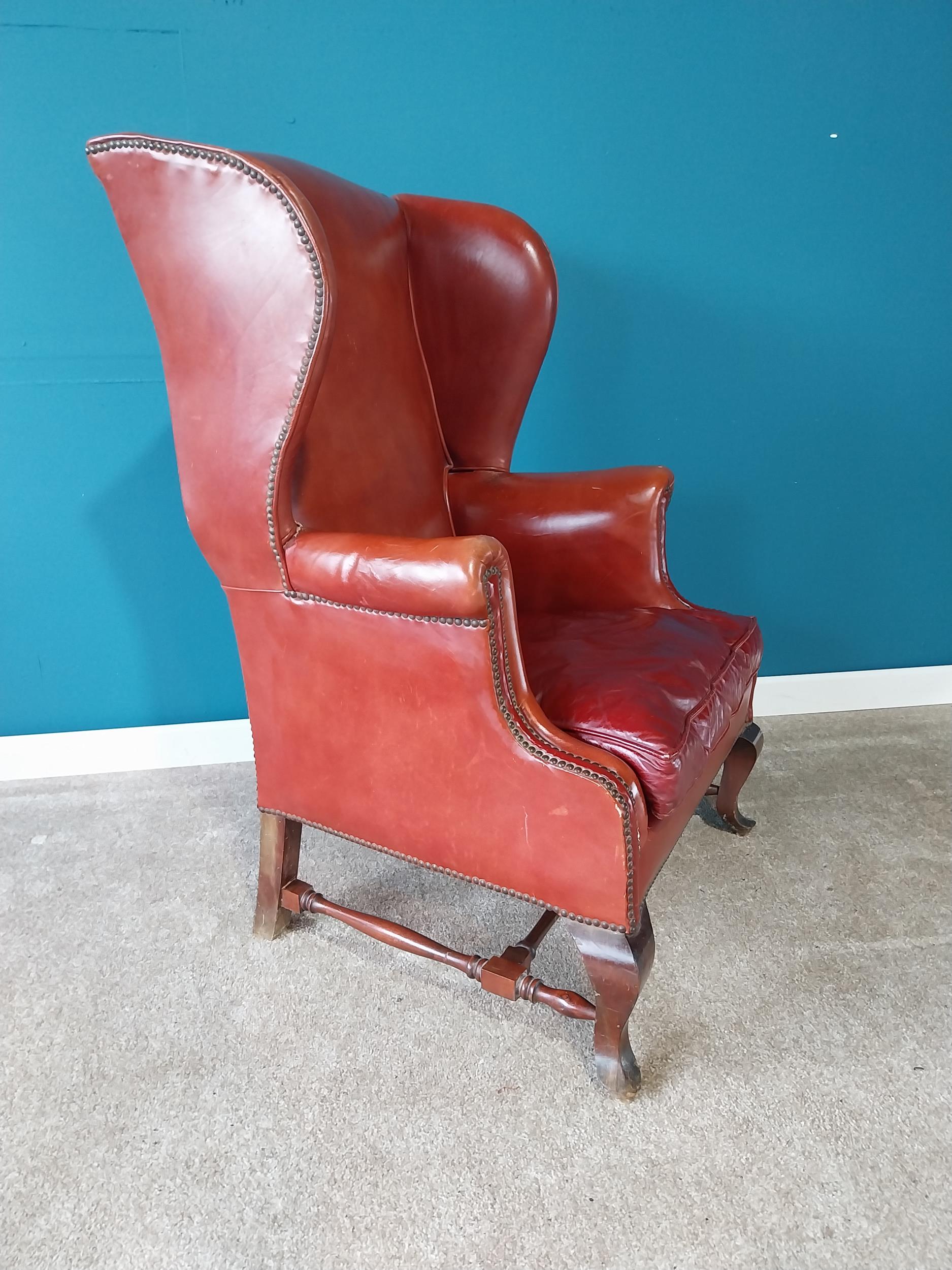 Leather wingback armchair raised on mahogany cabriole legs {114 cm H 77 cm W 67cm D}. - Image 3 of 4