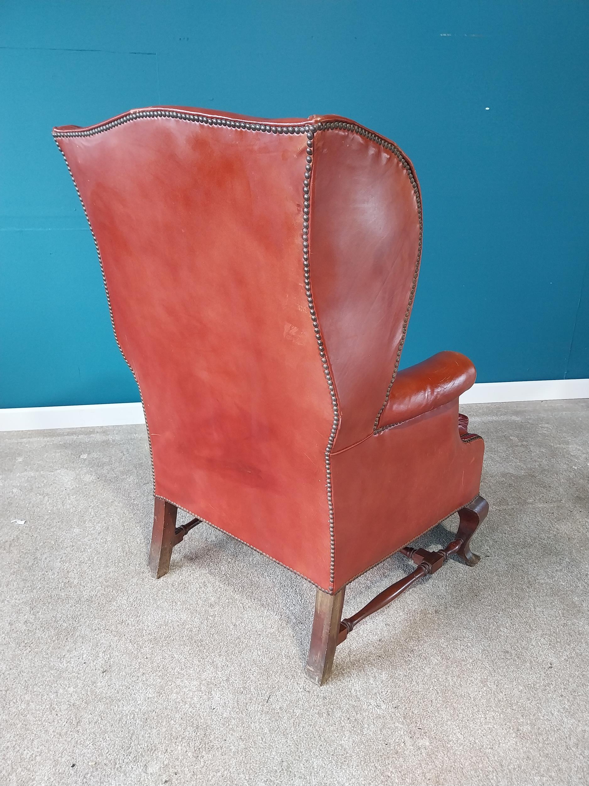Leather wingback armchair raised on mahogany cabriole legs {114 cm H 77 cm W 67cm D}. - Image 4 of 4