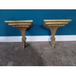 Pair of resin and gilt wall sconces in the Regency style. {35 cm H x 30 cm W x 21 cm D}.{ cm H cm