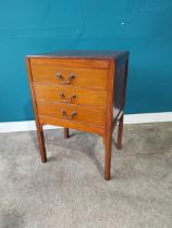 Edwardian mahogany side cabinet with three drawers raised on square legs. {72 cm H x 49 cm W x 37 cm