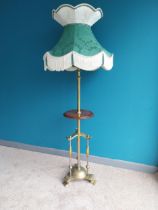 Edwardian brass and mahogany standard lamp with cloth shade {160 cm H x 58 cm Dia.}.