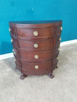 Mahogany demi lune side cabinet with four drawers flanked by eight drawers on lion's paw feet. {76