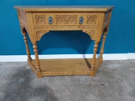 Oak hall table with single drawer in frieze in the Jacobean style. {77 cm H x 107 cm W x 33 cm