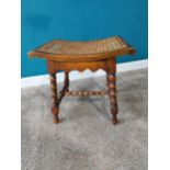 1950s walnut window stool with Berger seat raised on bobbin legs {45 cm H 47 cm W 37cm D}.
