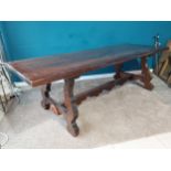 Good quality stained pine Spanish refectory table on lyre supports on single stretcher. {77 cm H x