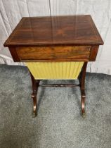 Regency rosewood and brass inlaid work table raised on brass castors {74 cm H x 51 cm W x 40 cm D}.