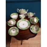 Twenty three piece green tea service with some damage. { cm H cm W cm D}.