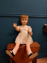 1970's Doll. {74 cm H}. { cm H cm W cm D}.