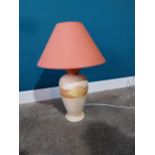 Ceramic table lamp with cloth shade {53 cm H 37 cm W 37cm D}.