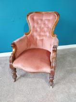 William IV carved mahogany and upholstered arm chair raised on turned legs and castors {98 cm H 70