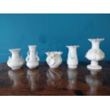 Collection of five Third Period Belleek ceramic vases {10 cm H to 20 cm H}.{ cm H cm W cm D}.