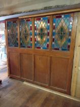 19th C. mahogany panel with four stained glass panels {208 cm H x 222 cm W x 5 cm D}.