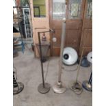 Two brass standard lamps {184, 156 cm H} and polished steel standard lamp {124 cm H}.