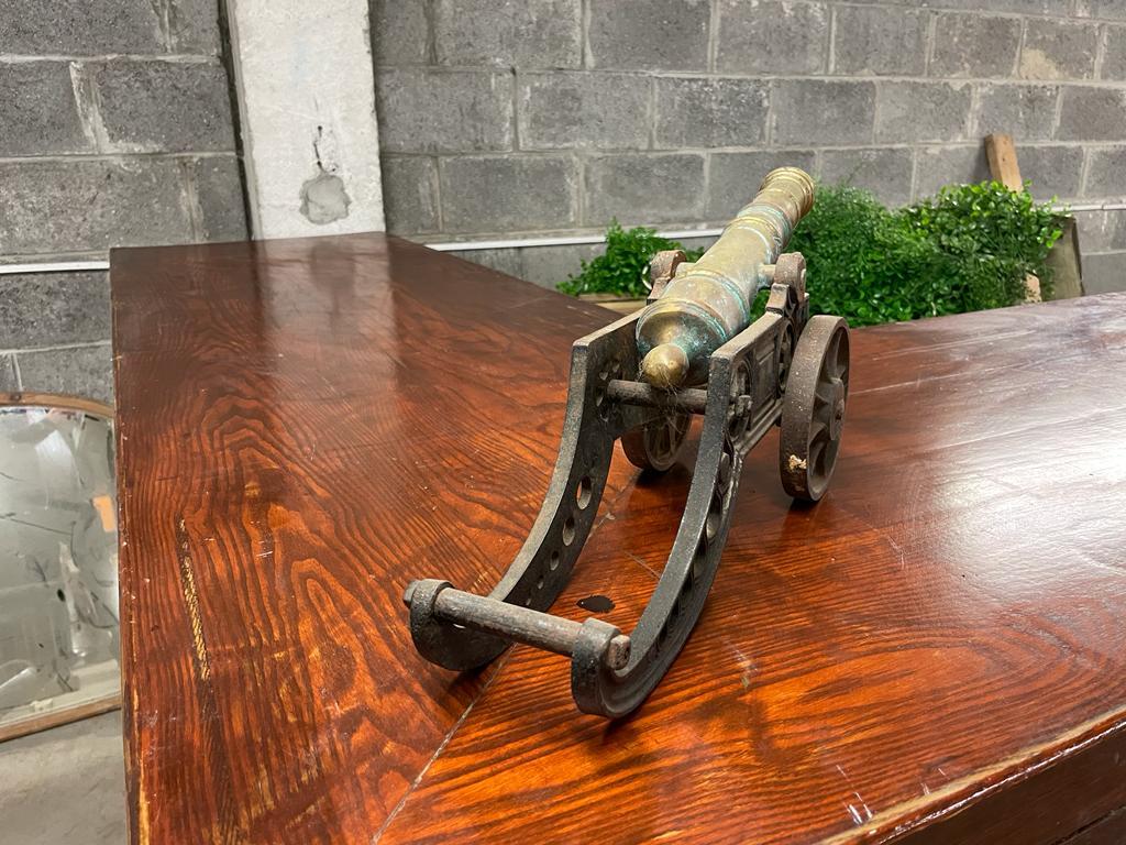 Brass and metal model of cannon {22 cm H x 46 cm W x 13 cm D}. - Image 2 of 2