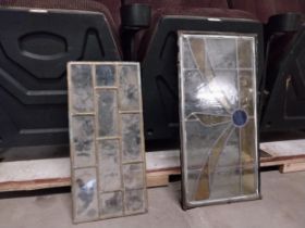 Two leaded stained glass panels {60, 50 cm H x 30, 24 cm W}.