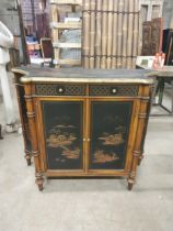 Good quality Japanese mahogany and lacquered side cabinet raised on turned legs {93 cm H x 117 cm