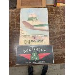 Two Aer Lingus cardboard advertising signs {40 cm H x 30 cm W and 16 cm H x 35 cm W}.