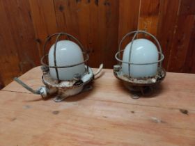 Pair of early 20th C. ships bulk head lights {Approx. 23 cm H x 16 cm W x 16 cm D}.