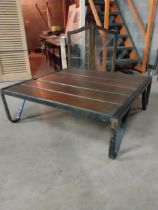 Industrial metal and wooden coffee table {34 cm H x 100 cm W x 100 cm D}.