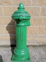 Irish cast iron water pump and tap {H 100cm x W 36cm x D 40cm }.