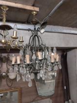 Decorative bronzed metal and crystal chandelier {70 cm H x 60 cm W x60 cm D}.