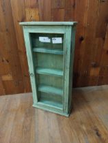 Painted pine wall mounted cabinet with single glazed door {81 cm H x 40 cm W x 15 cm D}.