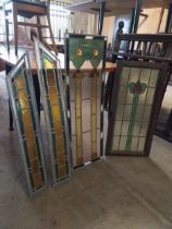 Four leaded stained glass panels {Approx. 95 cm H x 34 cm W}.