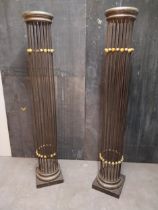 Pair of decorative metal columns {202 cm H x 36 cm W x 36 cm D}.